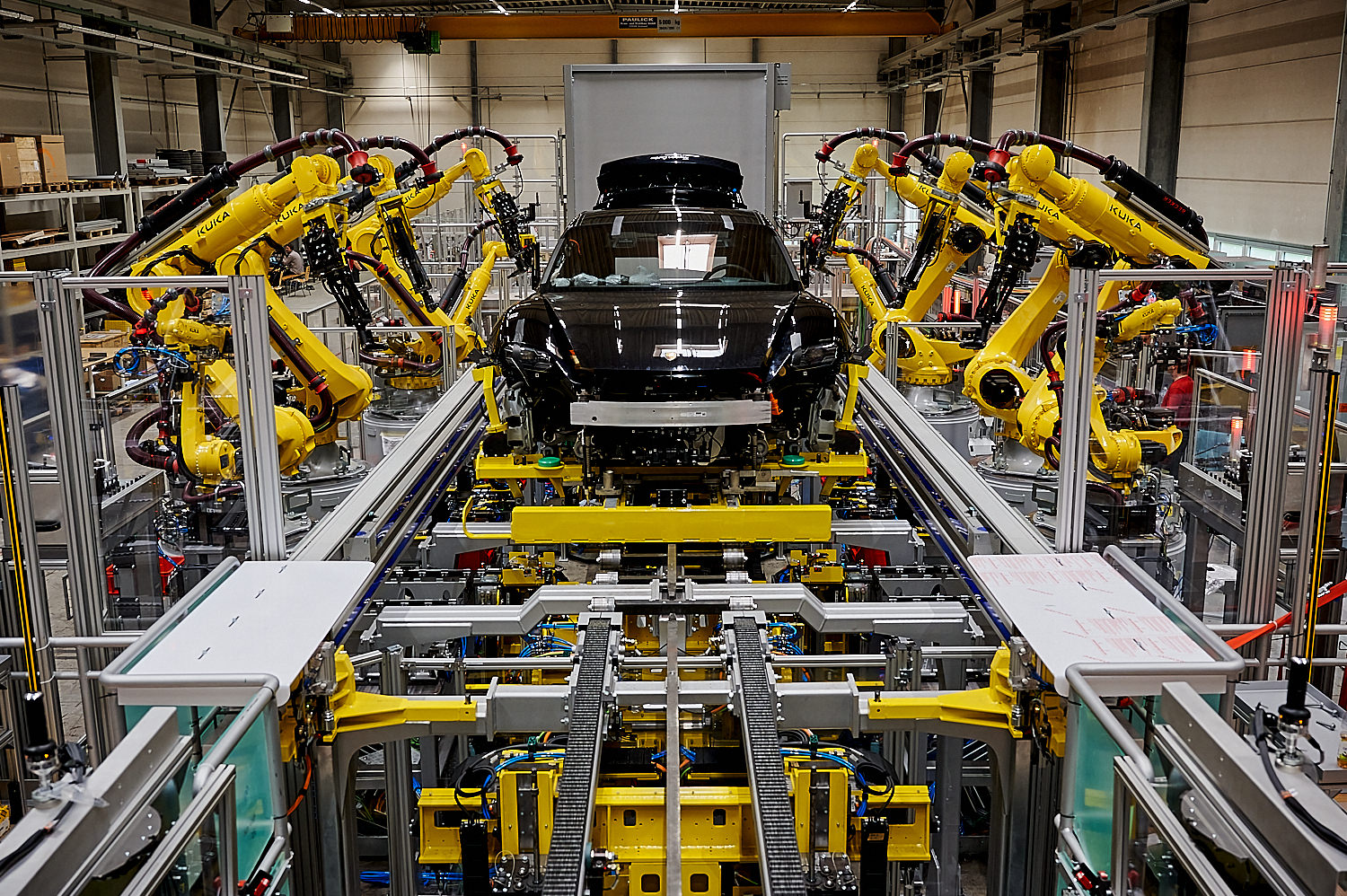 MBN engineers and technicians working on a final assembly system on the shop floor